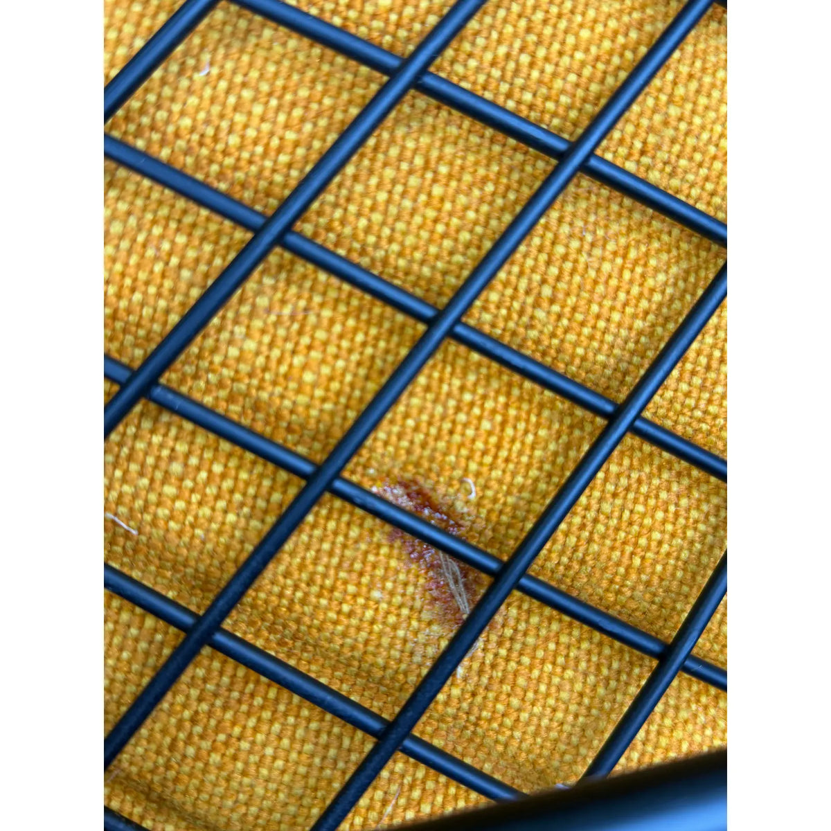 Mustard-upholstered Diamond lounge chair, small worn area in the fabric behind the wire grid