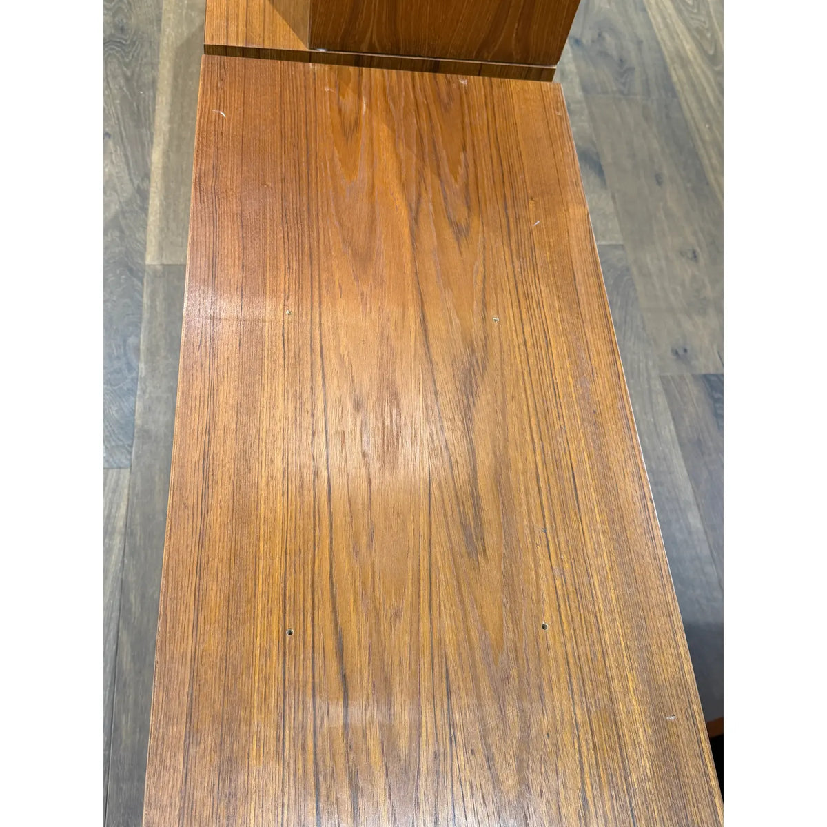 Hundevad teak wall unit with secretary, top surface grain and wear