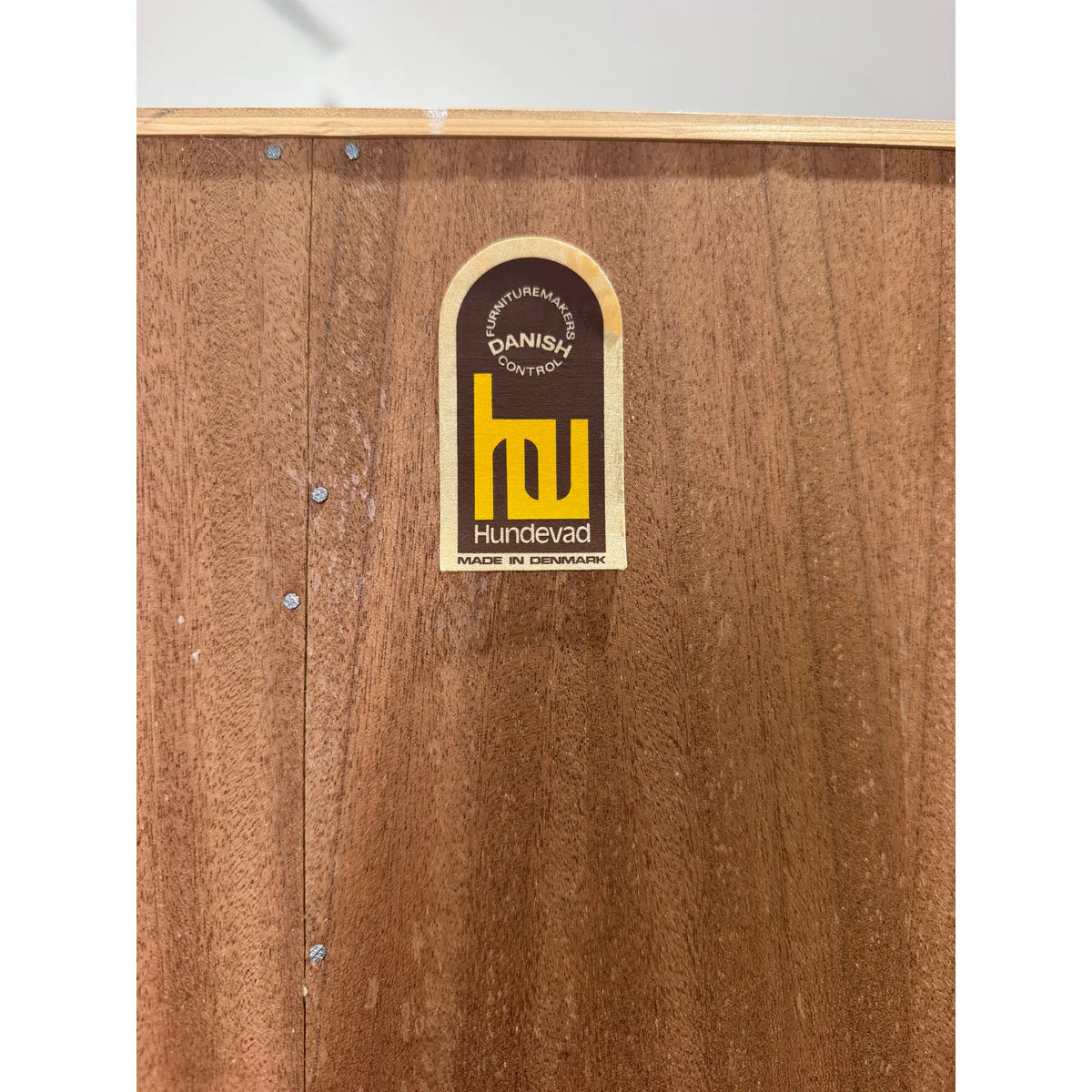 Hundevad teak wall unit with secretary, surviving Hundevad maker label on the rear panel